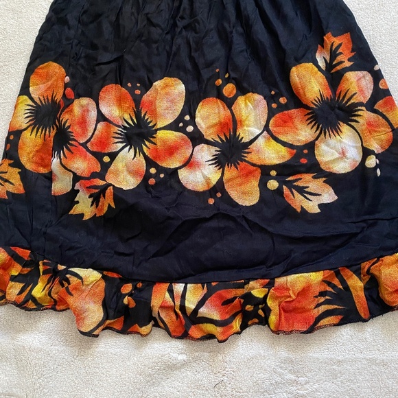 Black Halter Dress with Vibrant Floral Pattern - Picture 2 of 3